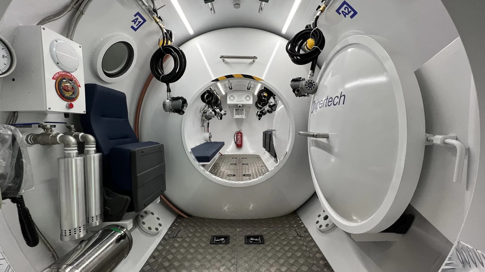 Hipertech decompression chamber installed in an equipment room